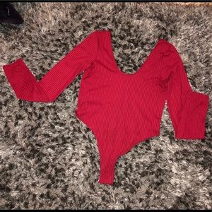 RED thong body suit!
